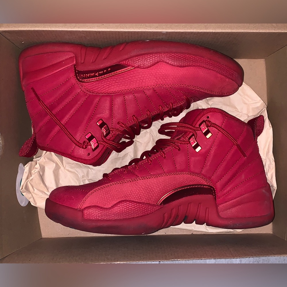 All red Jordan 12s